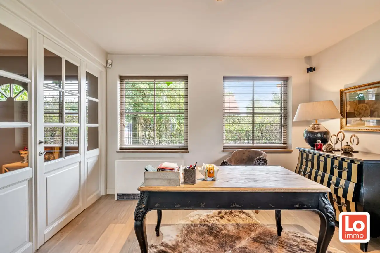 VERKOCHT! Charmante alleenstaande woning met inpandige garage en grote tuin op een rustige, groene locatie nabij het centrum van Beervelde! foto 5