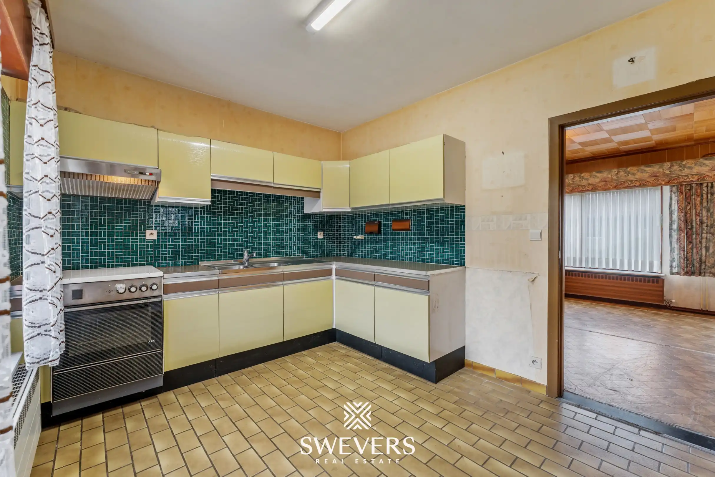 Charmante woning met ruime tuin en renovatiemogelijkheden in Halen foto 9