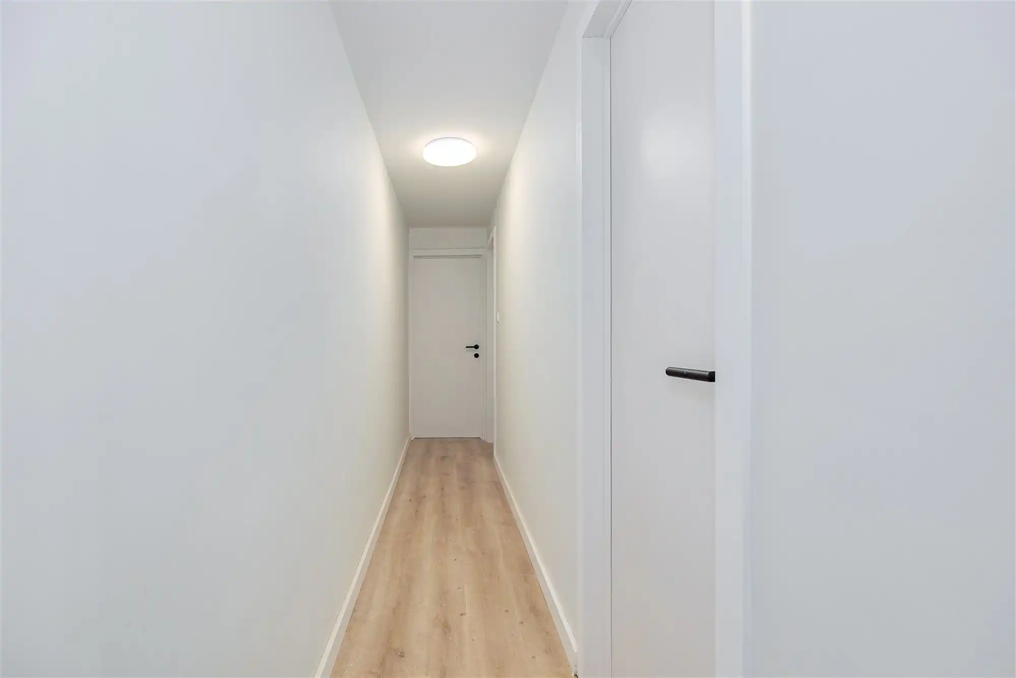 Gelijkvloers instapklaar appartement met tuin foto 8