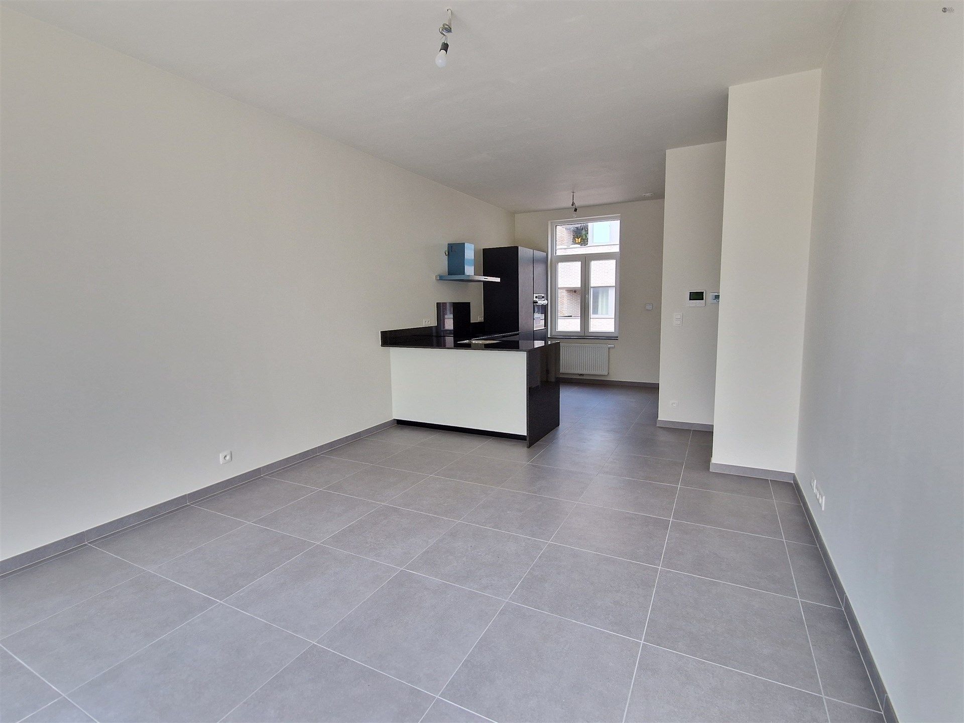 Uitzondelrijk duplex appartement met 2 slpkm en zolder. foto 4