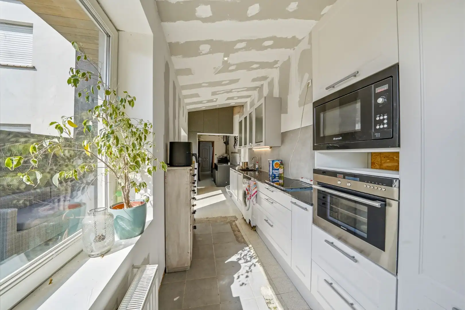 Te renoveren woning met ruime tuin in Bredene foto 5