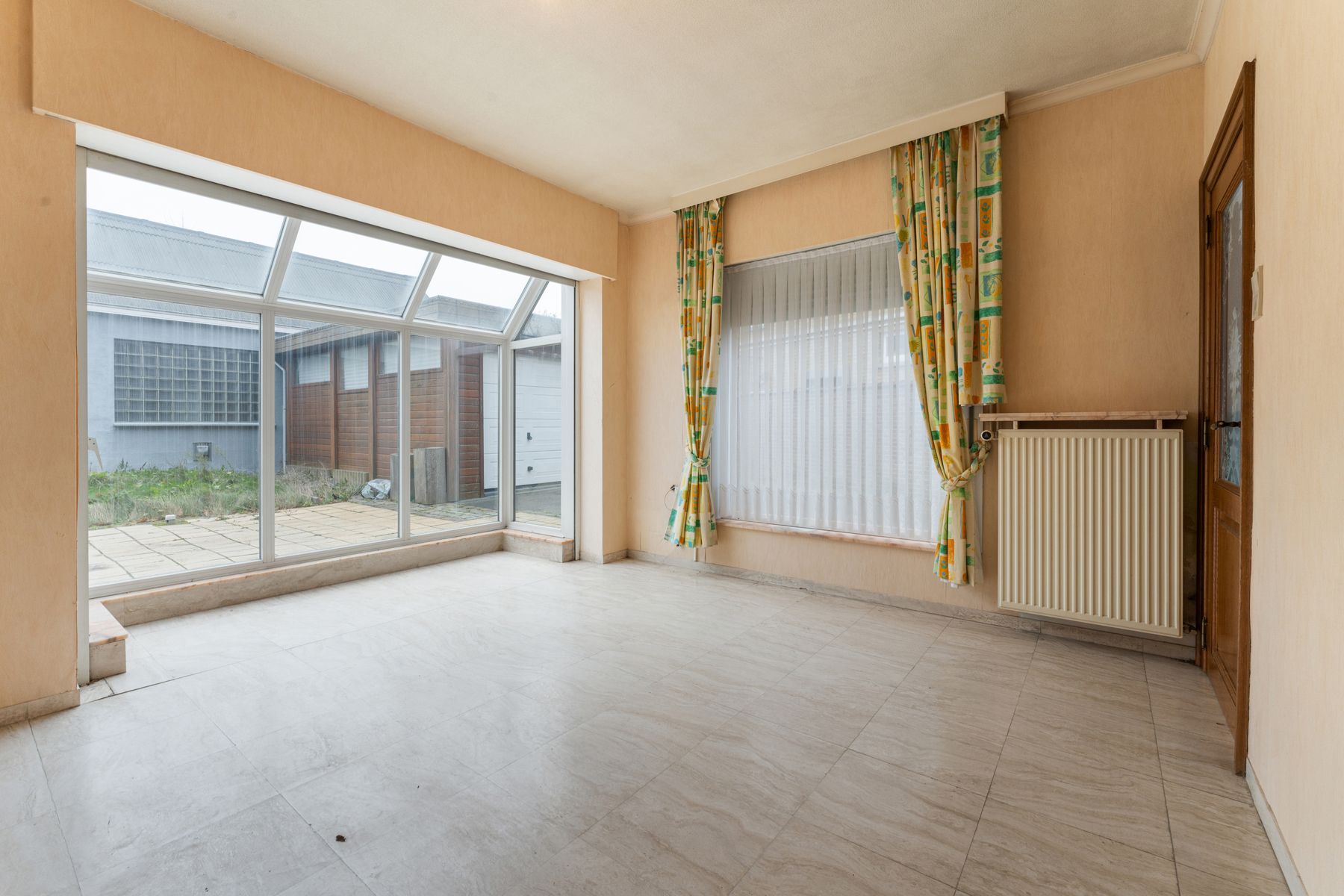 Centraal gelegen woning met 4 slpk , 2 garages en stadstuin foto 10