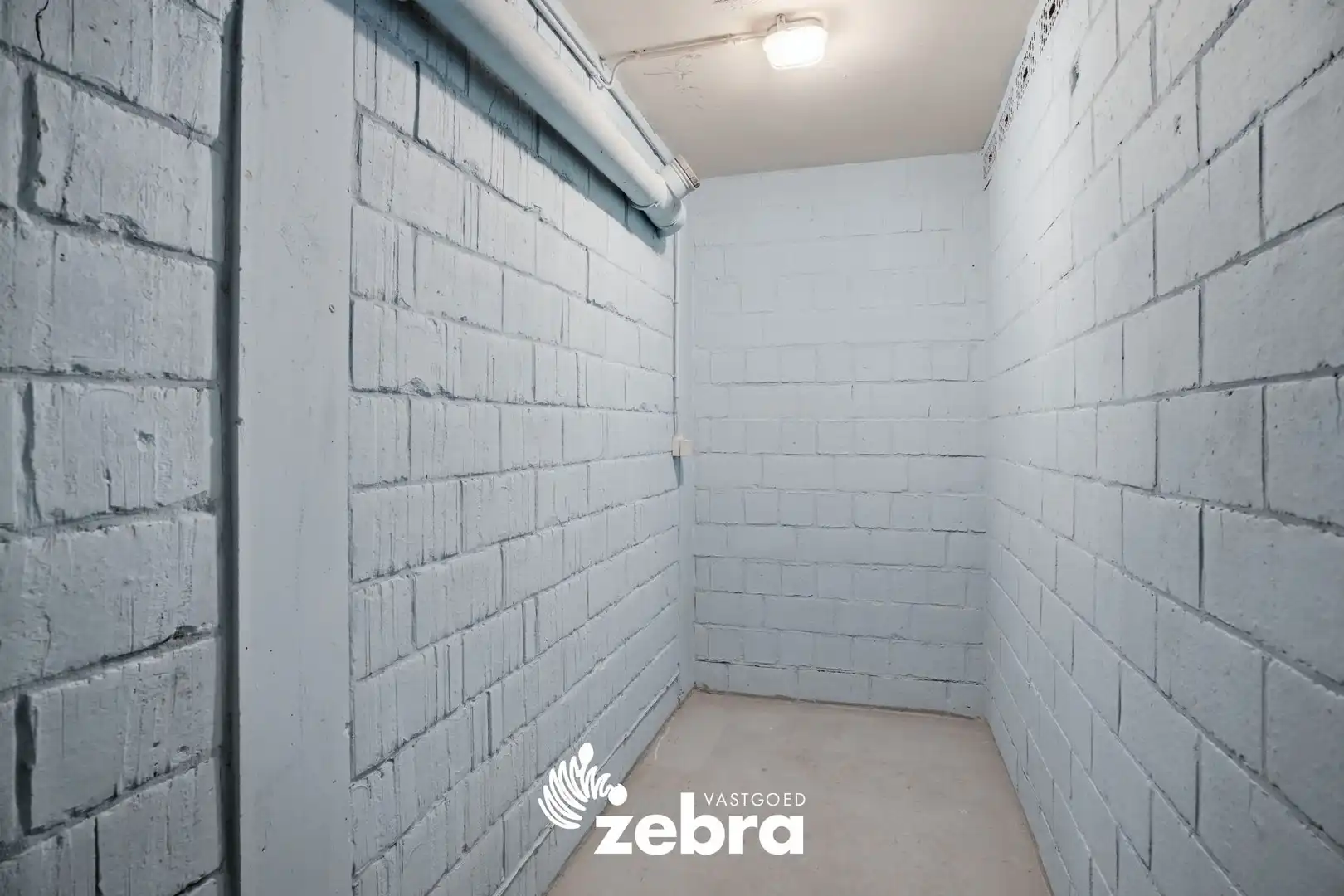 Gelijkvloers 2-slaapkamerappartement met terras en garage in centrum Tielt! foto 14