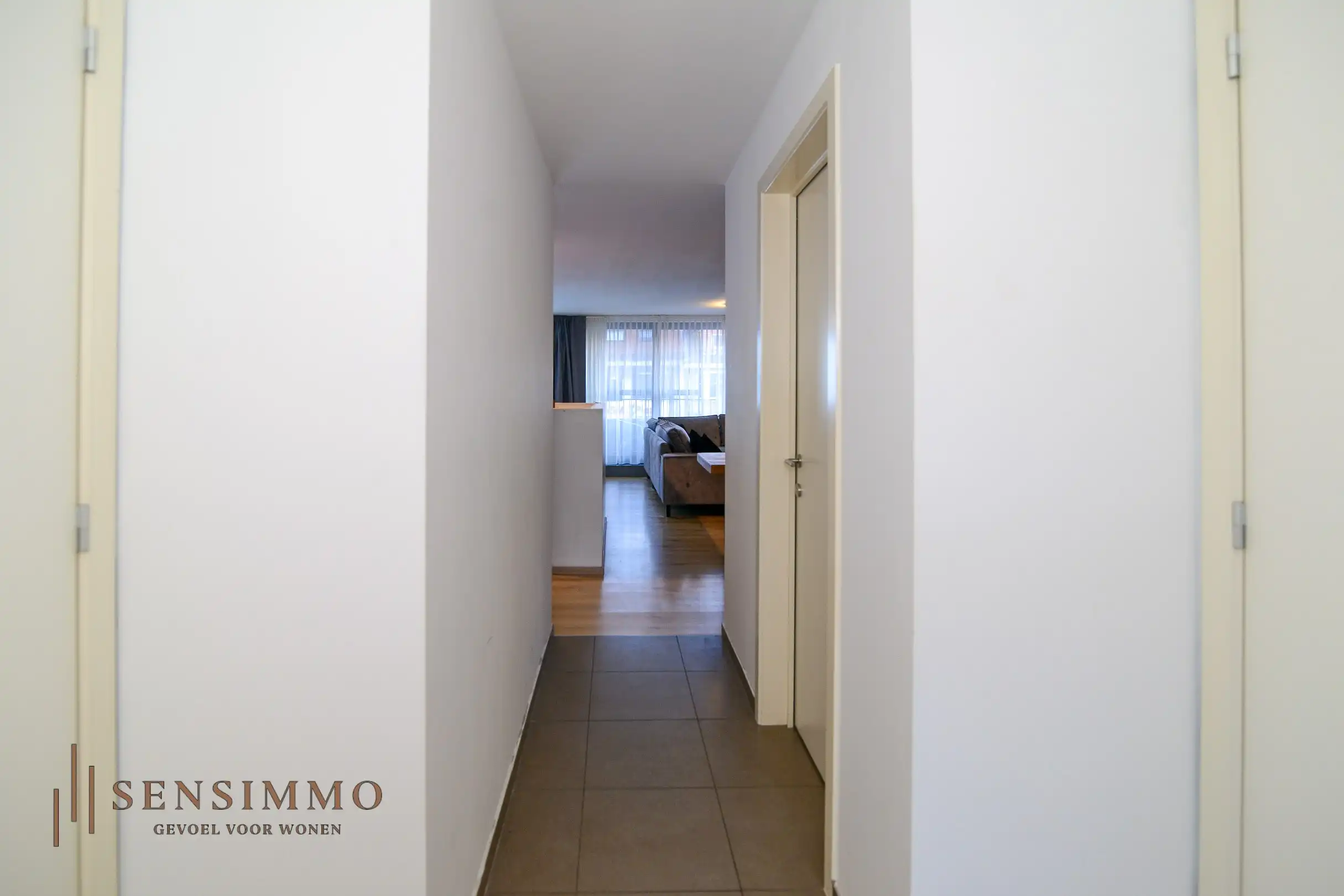 Instapklaar 2-slaapkamerappartement met dubbele terrassen en garagebox in hartje Eisden foto 12