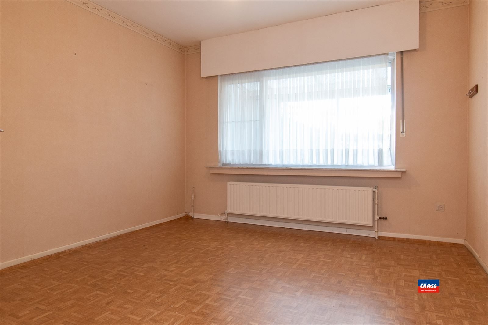 Gelijkvloersapp. met 2 slpks, tuin + garage foto 3