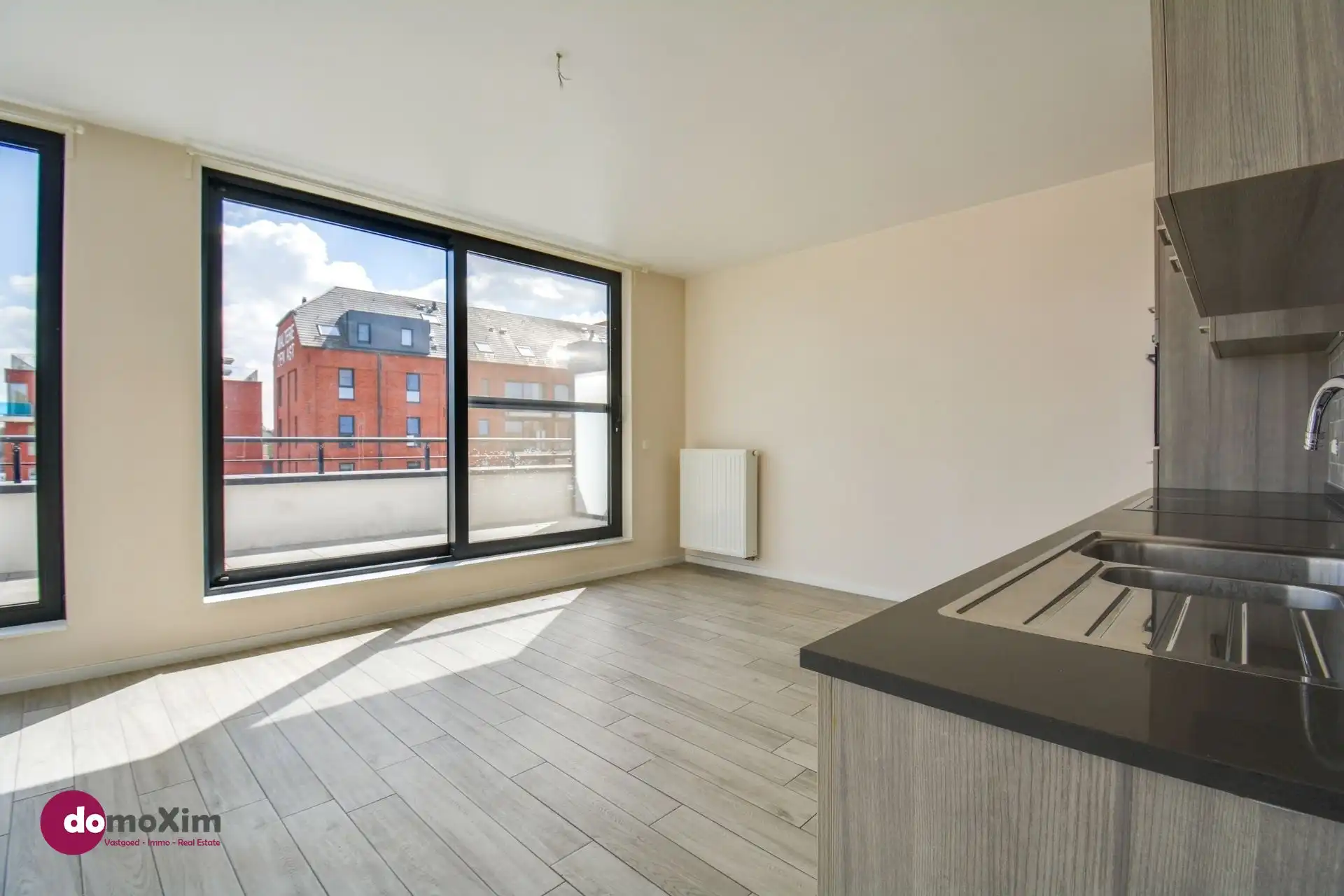 Lichtrijk appartement met 2 slaapkamers en groot terras in hartje Boortmeerbeek foto 2