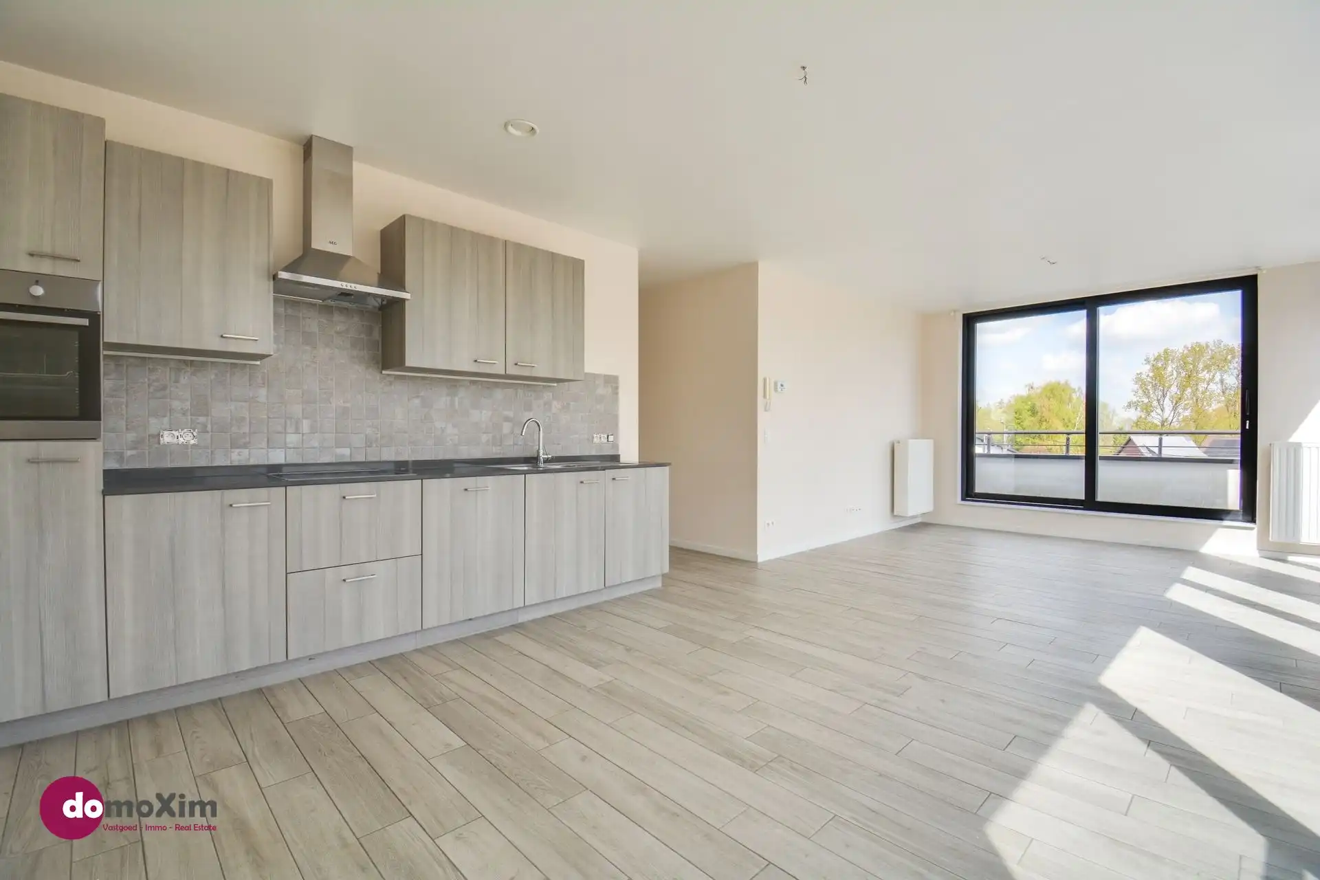 Lichtrijk appartement met 2 slaapkamers en groot terras in hartje Boortmeerbeek foto 2