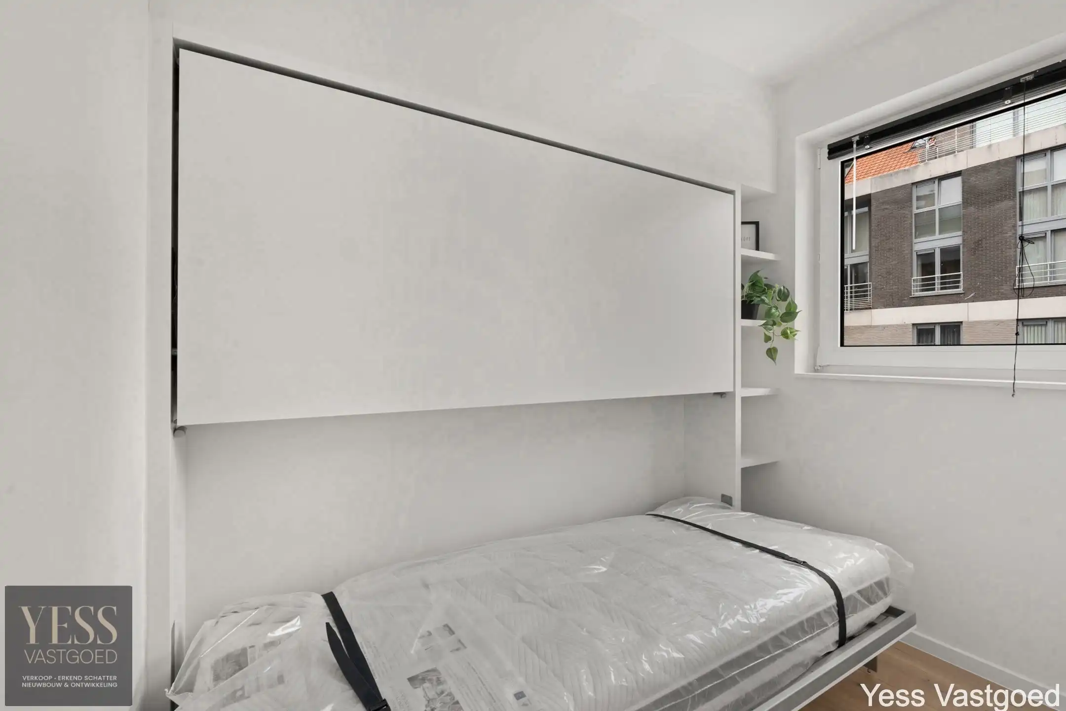 Prachtig gerenoveerd app met 2 slaapkamer centraal gelegen. foto 10