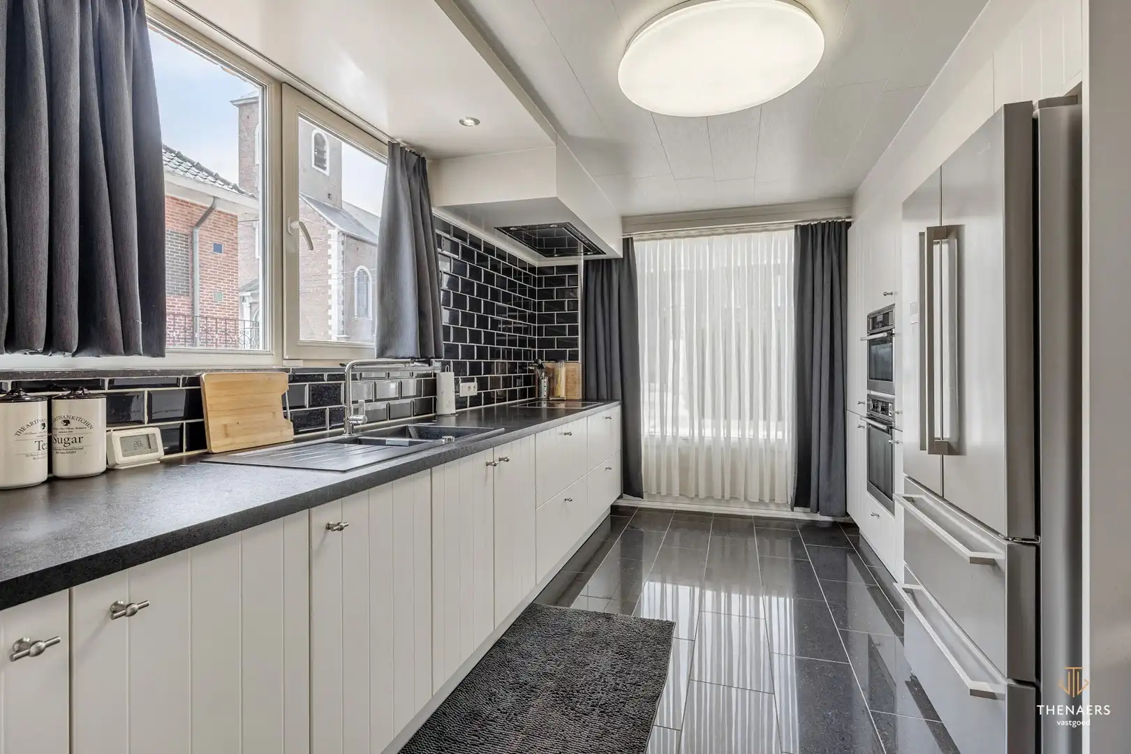 Gezinswoning met drie slaapkamers, garage en aangename buitenruimtes in het landelijke Opheers. foto 7
