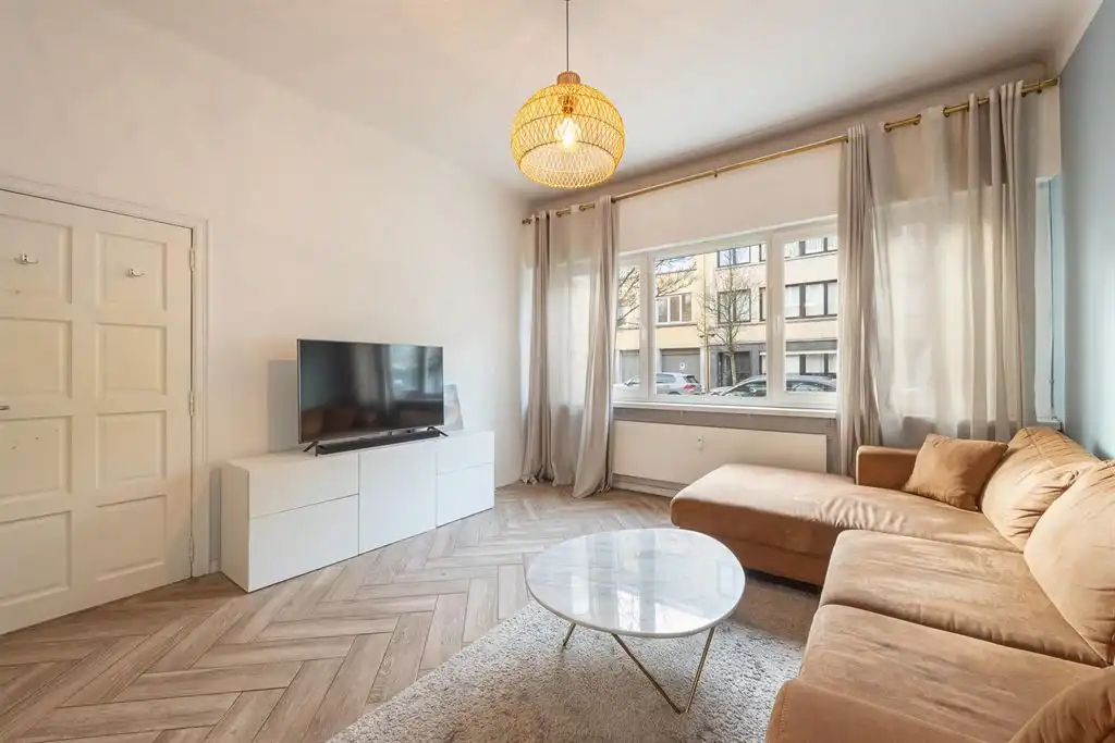 Gelijkvloers appartement met zonnige tuin foto 12