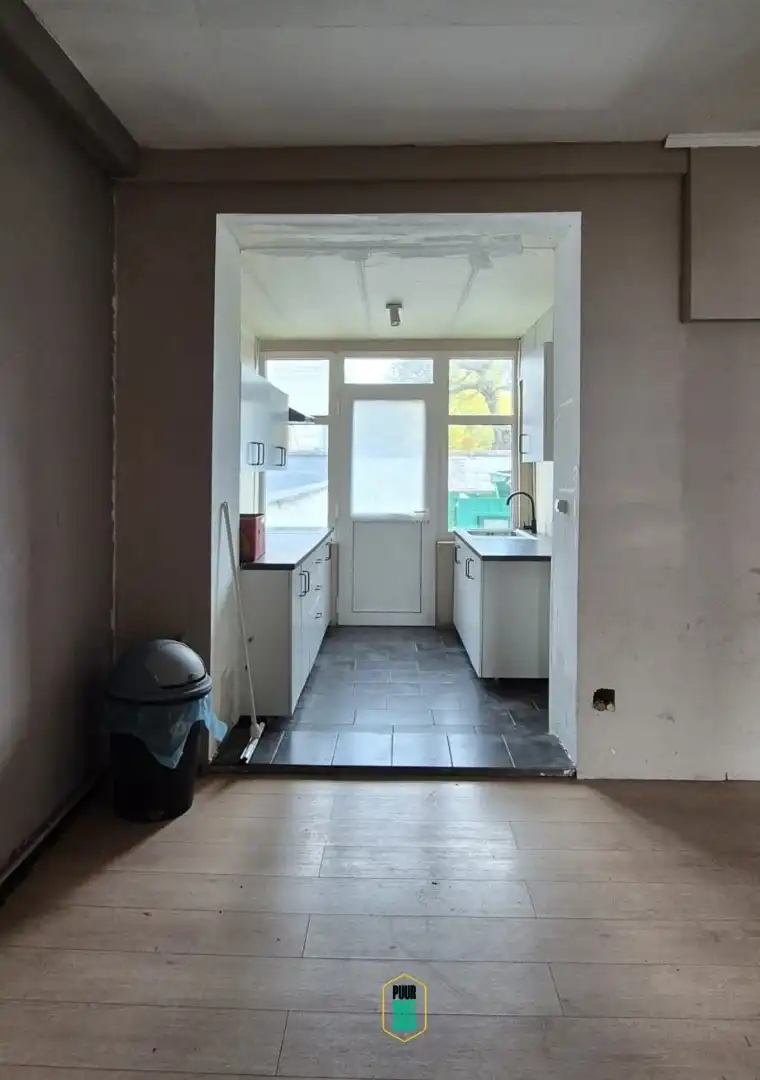 Welgelegen vlakbij Visartpark: grondig op te knappen huis met leuke tuin foto 9