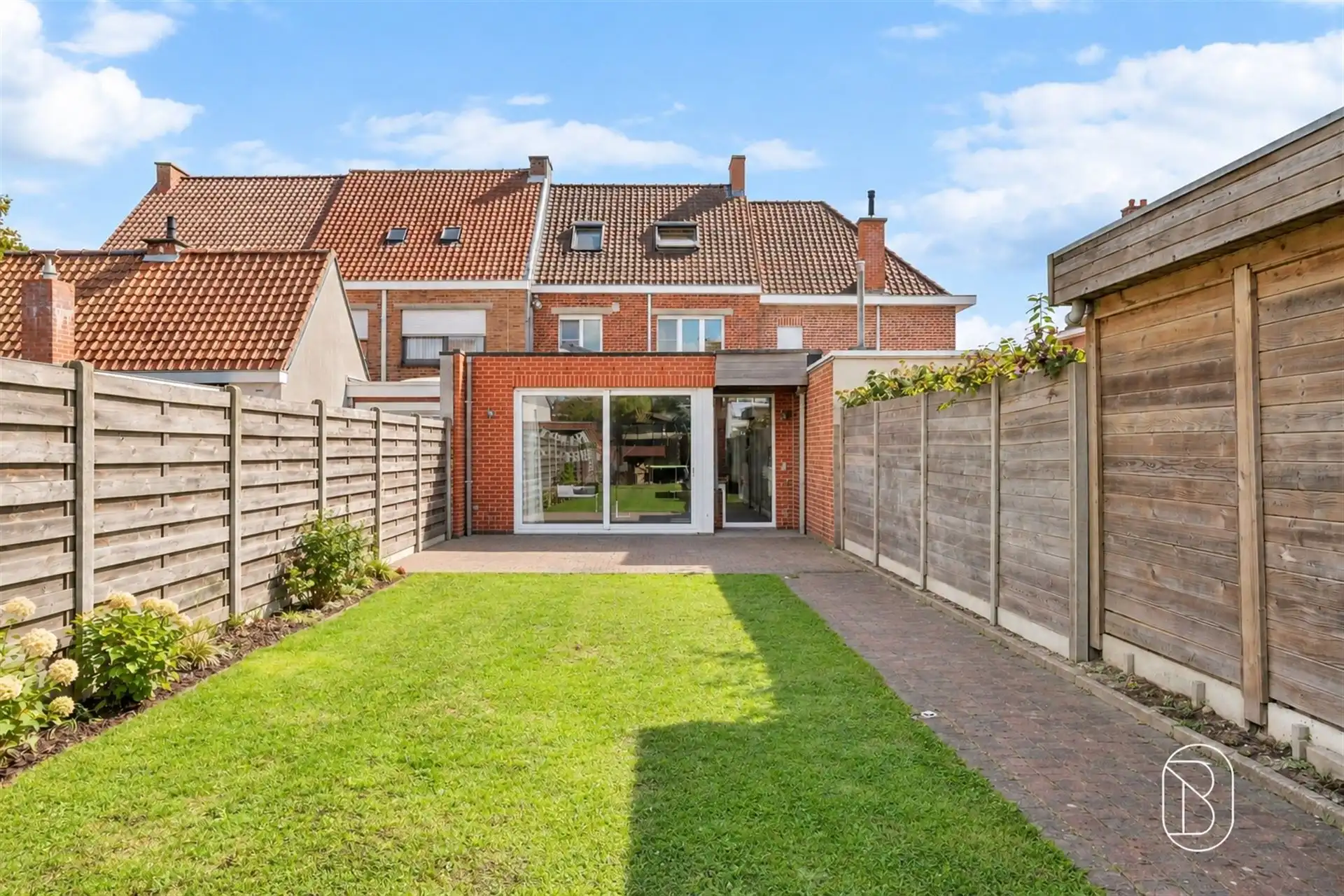 Gezinswoning met 3 slk, tuin en extra uitweg in Kuurne foto 2