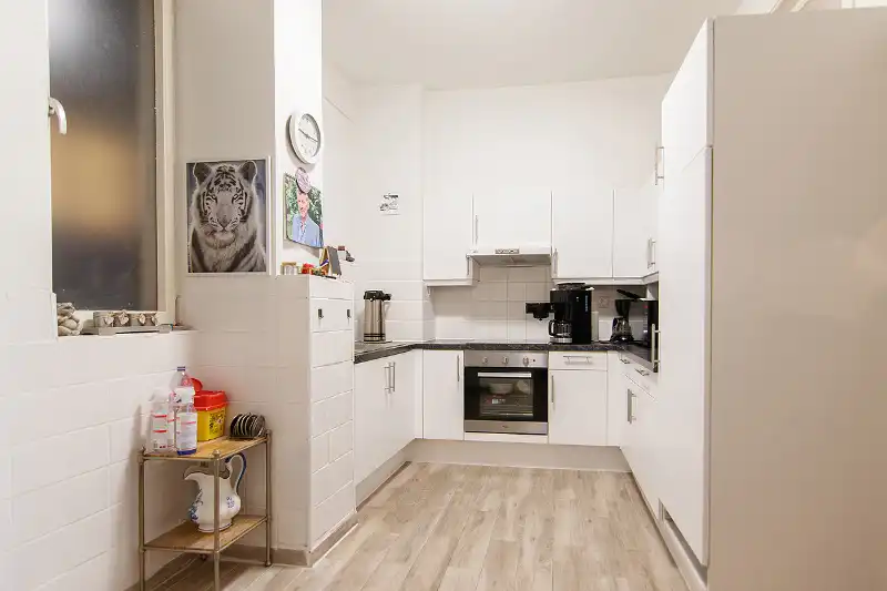Interessante lange termijn opbrengsteigendom met gunstig EPC op een TOP-locatie met trouwe huurster inclusief garage en berging foto 3