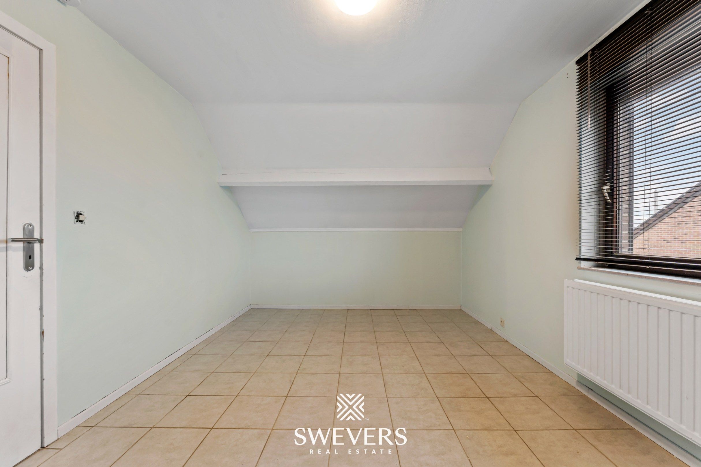 Instapklare open bebouwing met zuidgerichte tuin nabij het centrum van Heusden foto 13