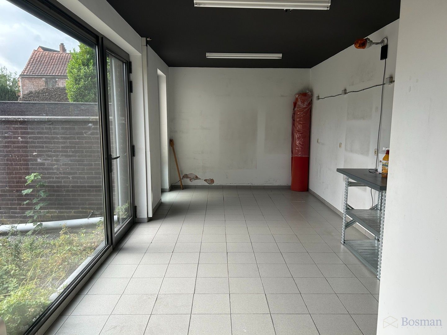 Ruim handelspand met tal van mogelijkheden in het centrum van Tessenderlo te koop foto 19