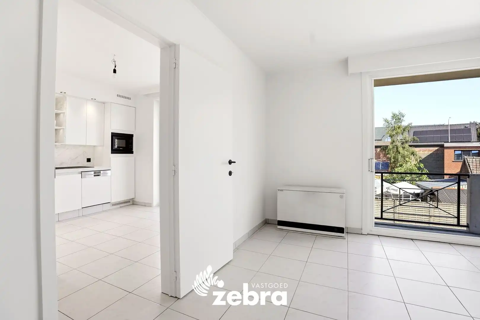 Zeer ruim appartement (137 m²) te koop met dubbele garage in het hartje van Tielt! foto 7