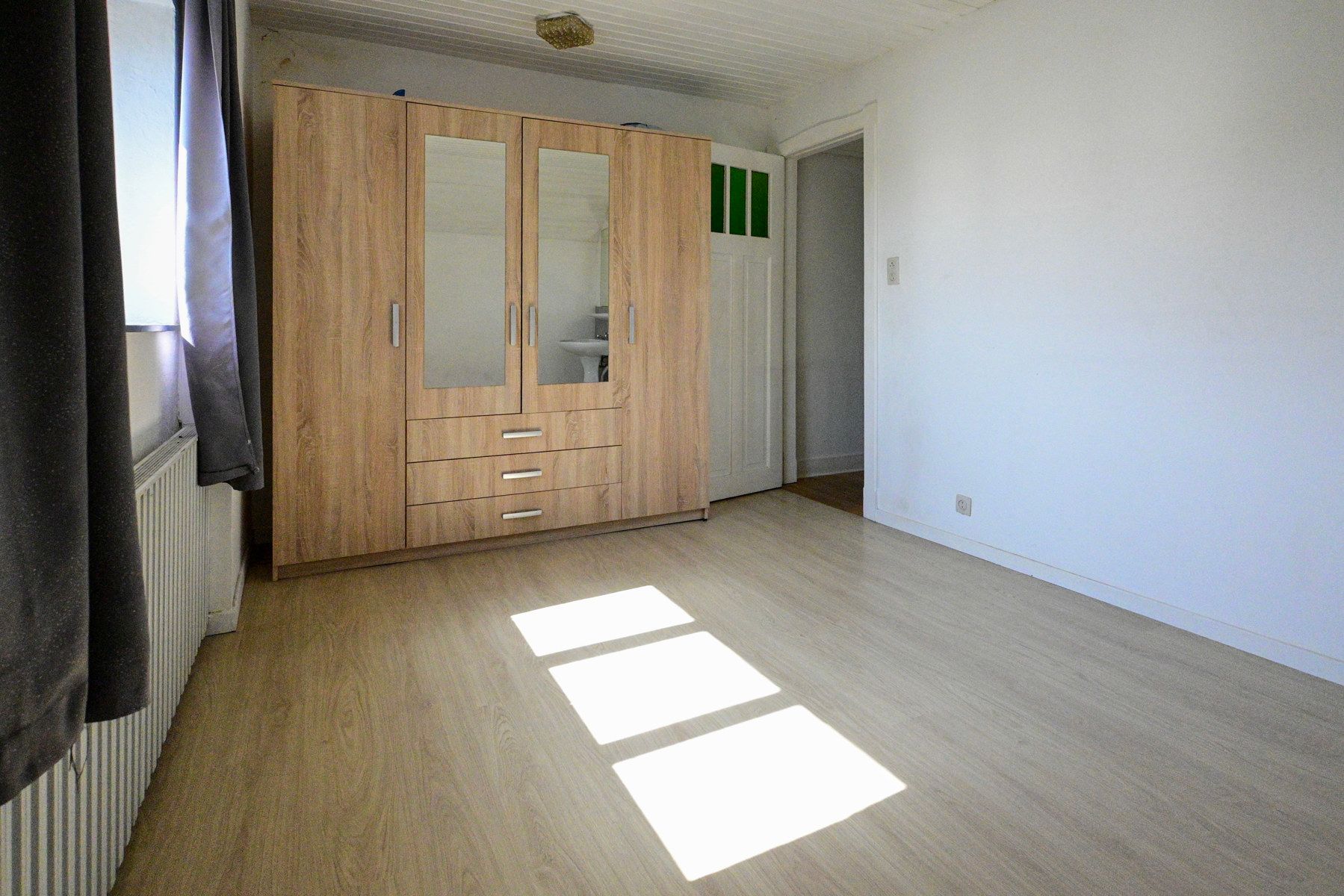 Charmante woning, net om de hoek van het strand te Bredene. foto 13