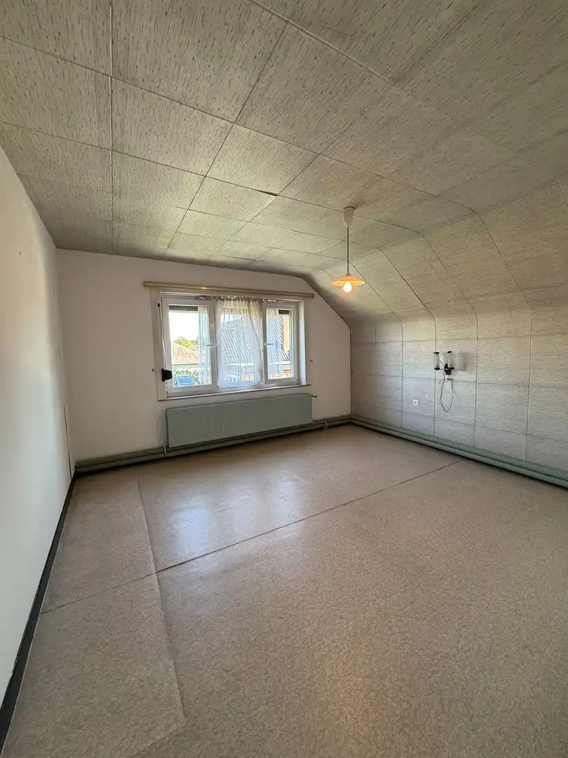 Ruime woning met 2 slaapkamers, veranda en volledig omheinde tuin te Heppen foto 25