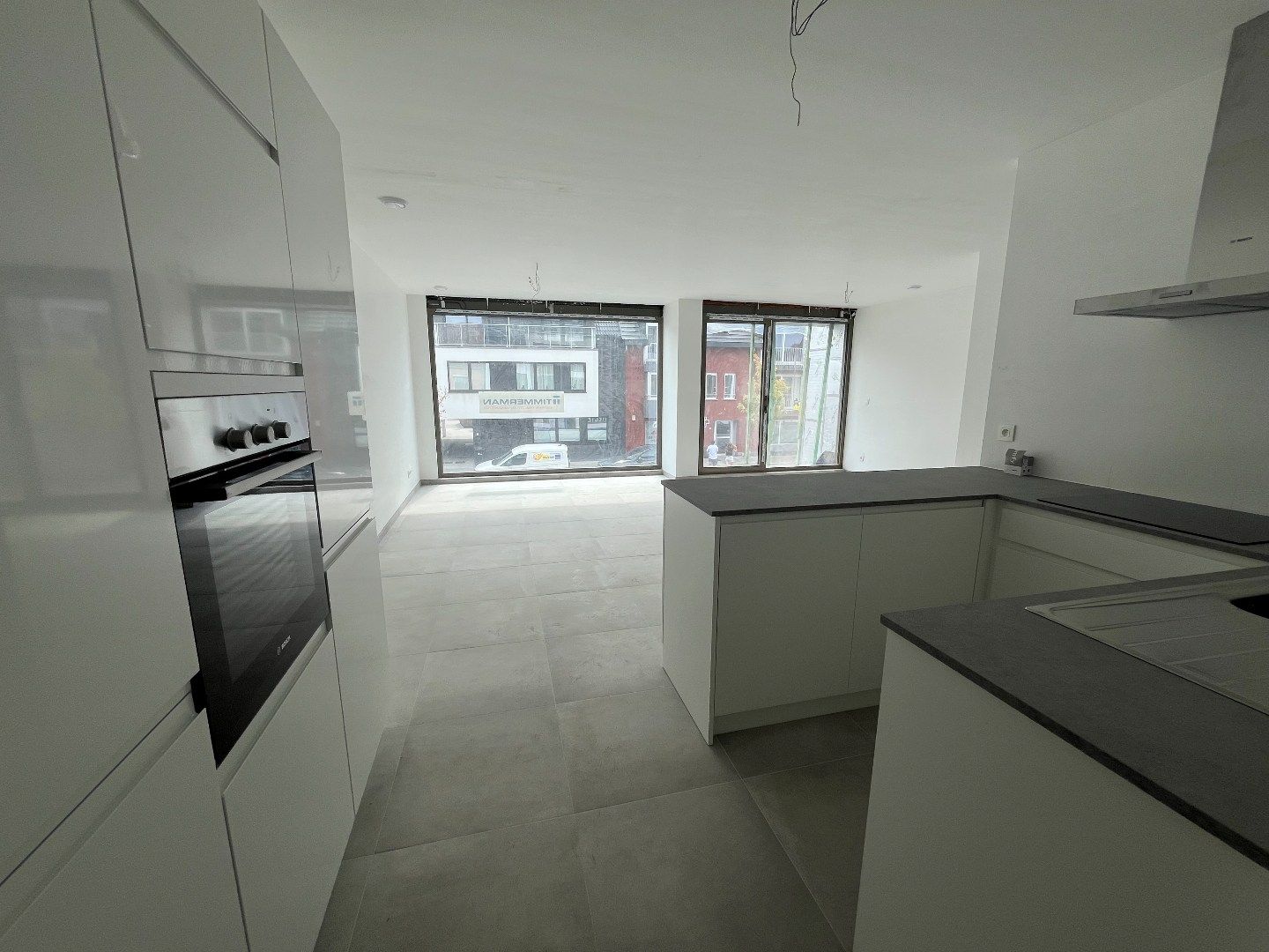 Mooi nieuwbouwappartement met groot terras! foto {{pictureIndex}}
