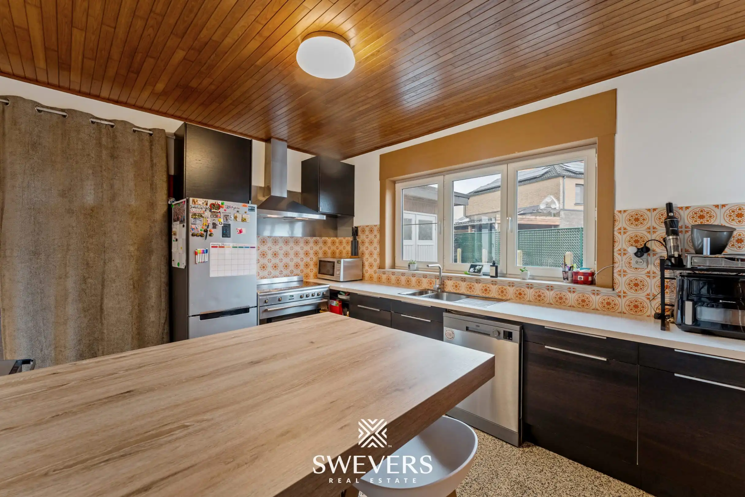 Woning met potentieel, vernieuwd dak en ramen te Borgloon foto 10