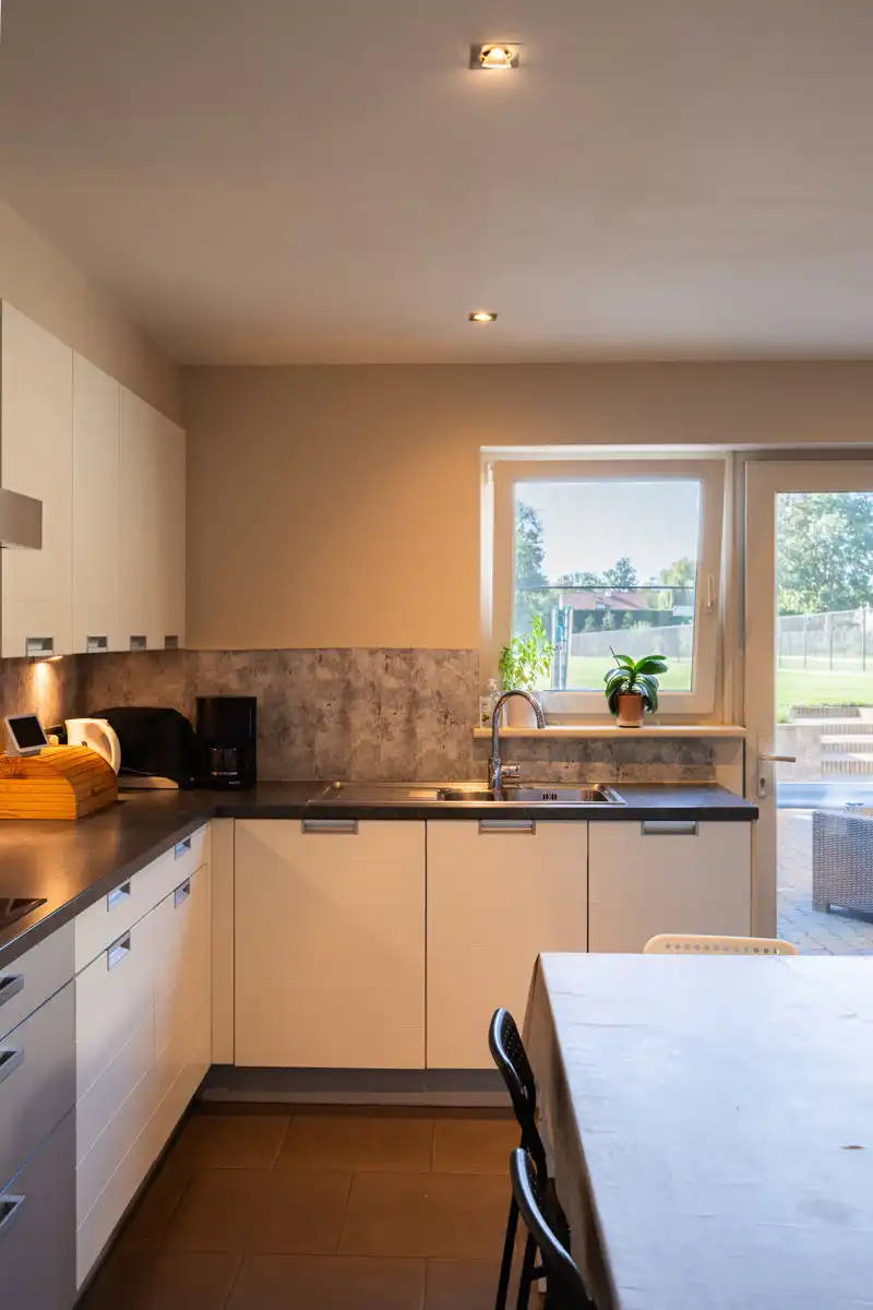 Ruime energiezuinige woning met 6 SLPK's en diepe tuin foto 9