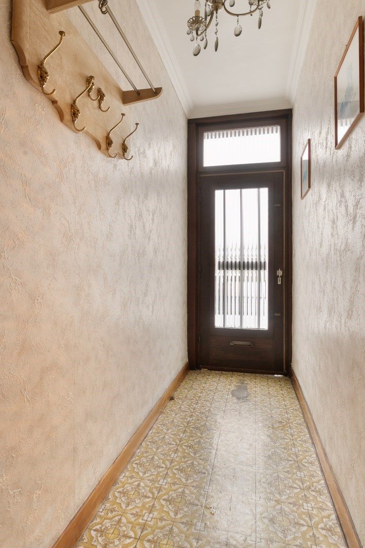 Gezellige te  renoveren woning met tuin in rustige buurt! foto 3