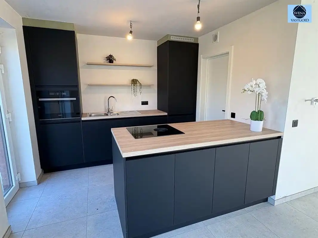  HALFOPEN NIEUWBOUWWONING MET 3 SLAAPKAMERS EN TUIN foto 6