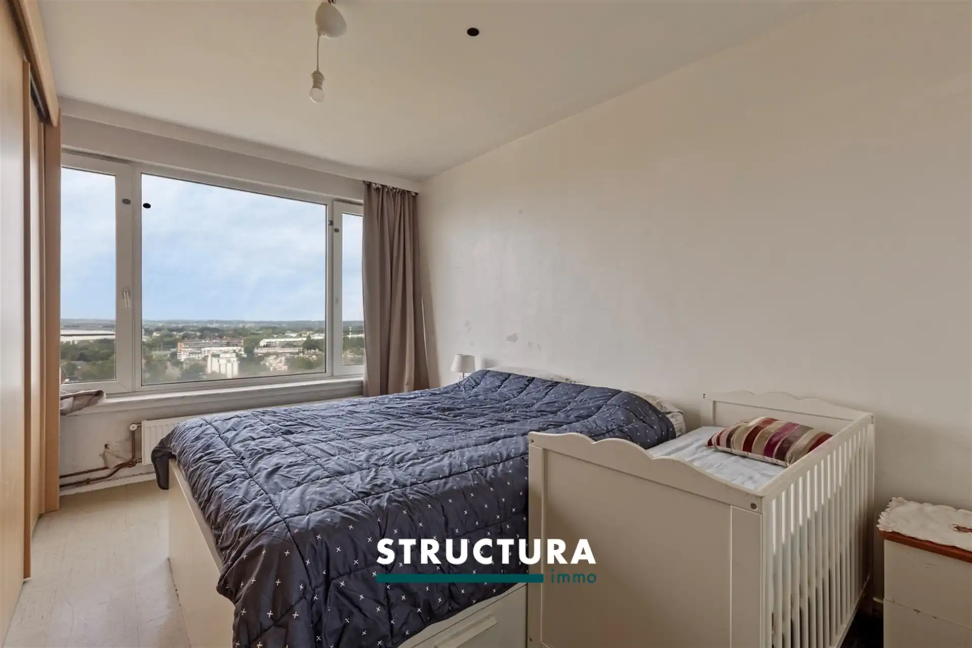 Appartement met 2 slaapkamers en prachtig uitzicht over Brussel. foto 6