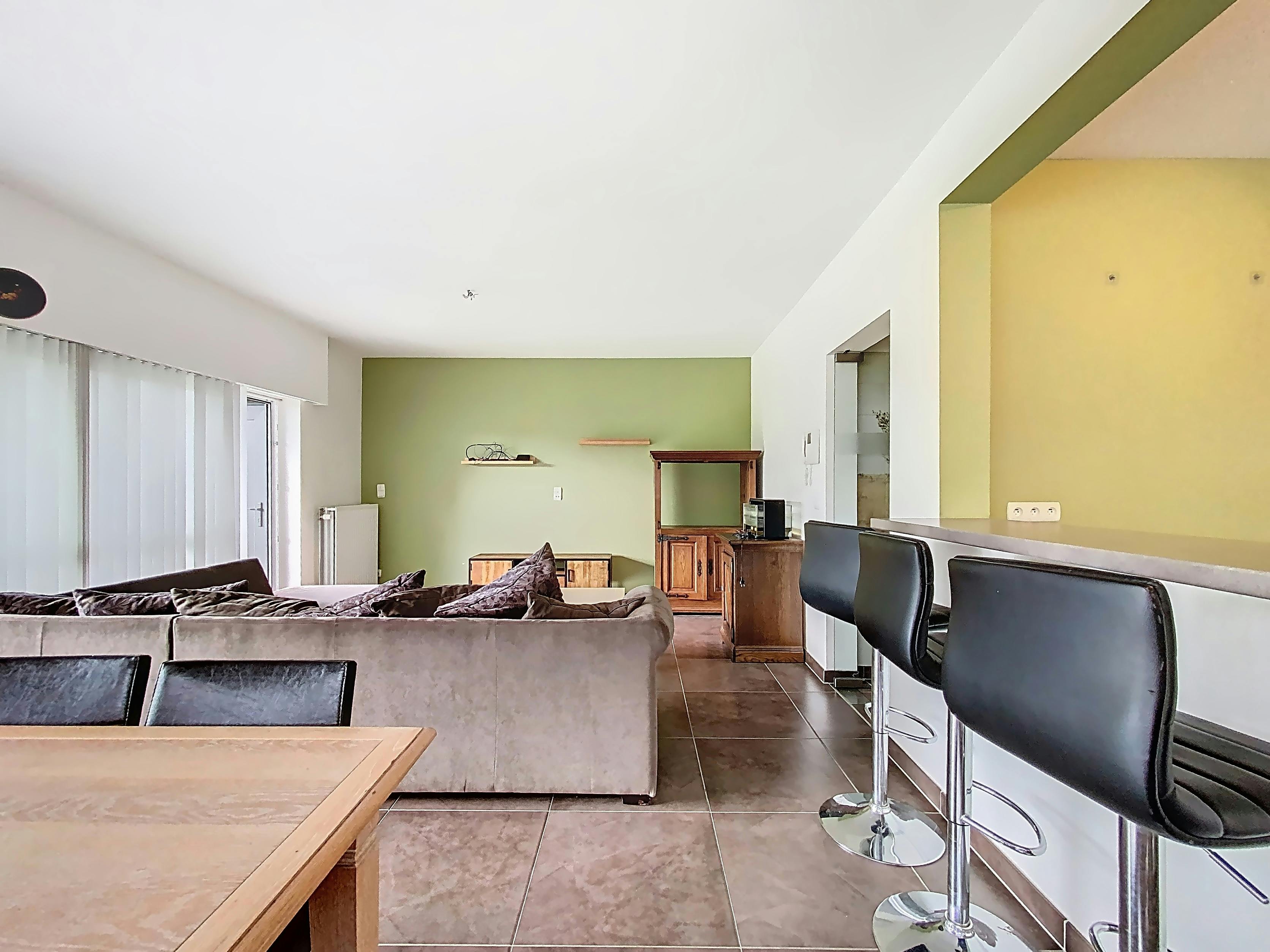 Gezellig gelijkvloers appartement met 2 slaapkamers en tuin foto 4