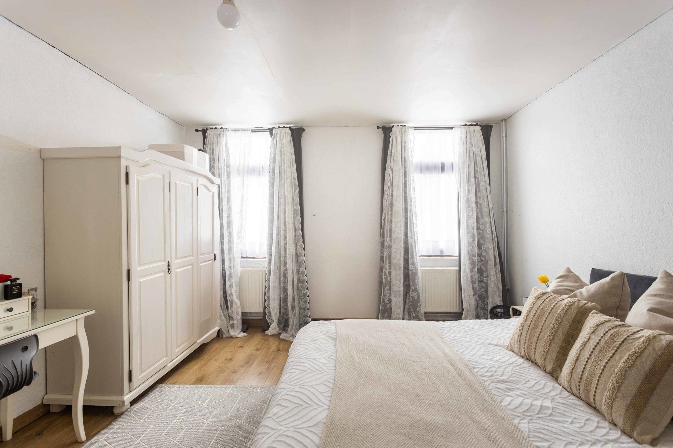 Interessante investering: verhuurde woning vlakbij centrum. foto 12