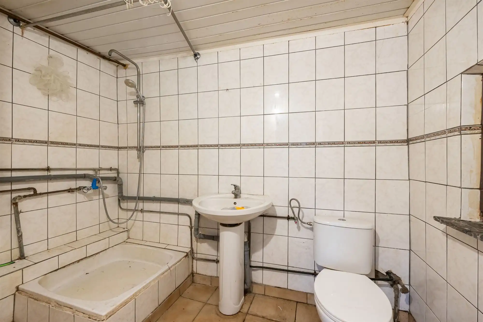 Te renoveren ééngezinswoning met 3 slpkrs, tuin en garage foto 8