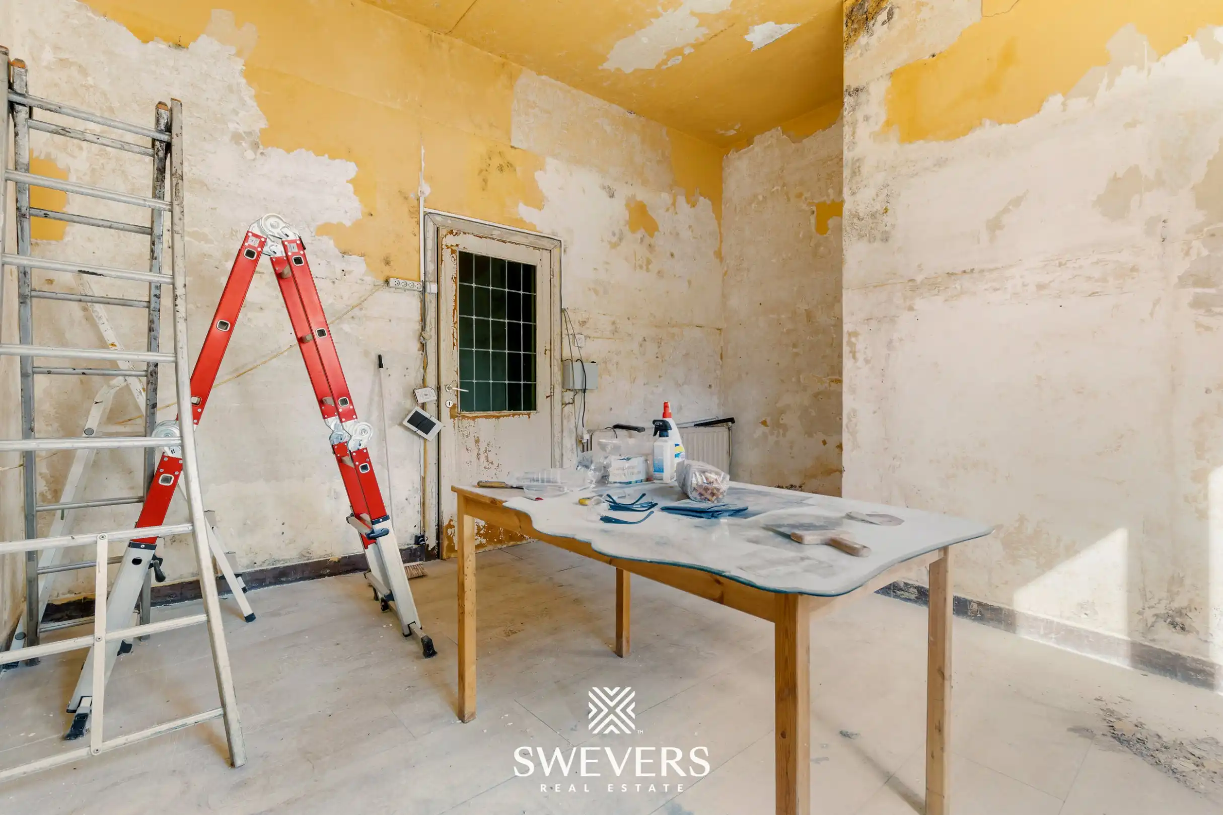 Uitstekend gelegen te renoveren woning met 3 slaapkamers foto 16