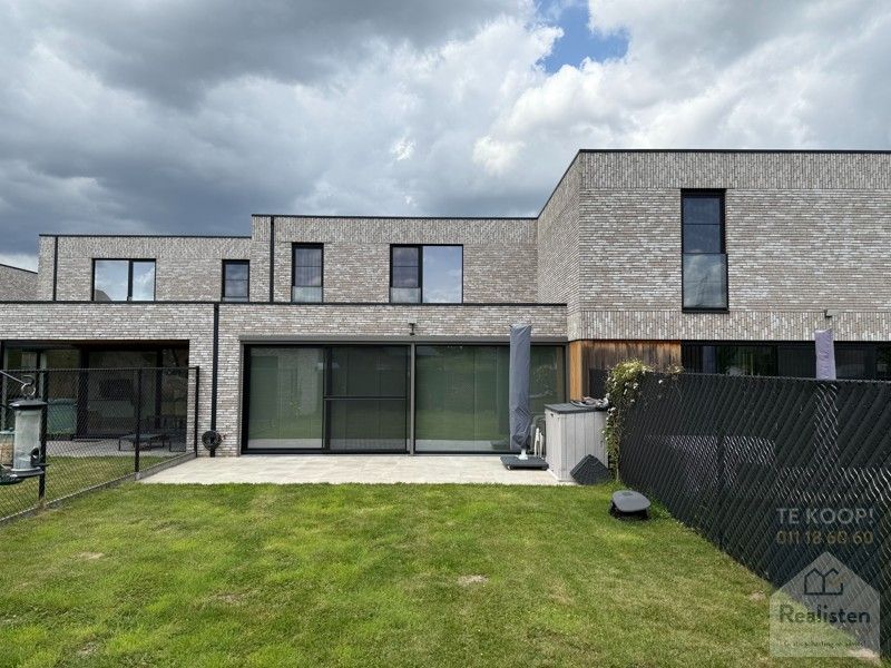 Schakelwoning in hartje Godsheide foto 3