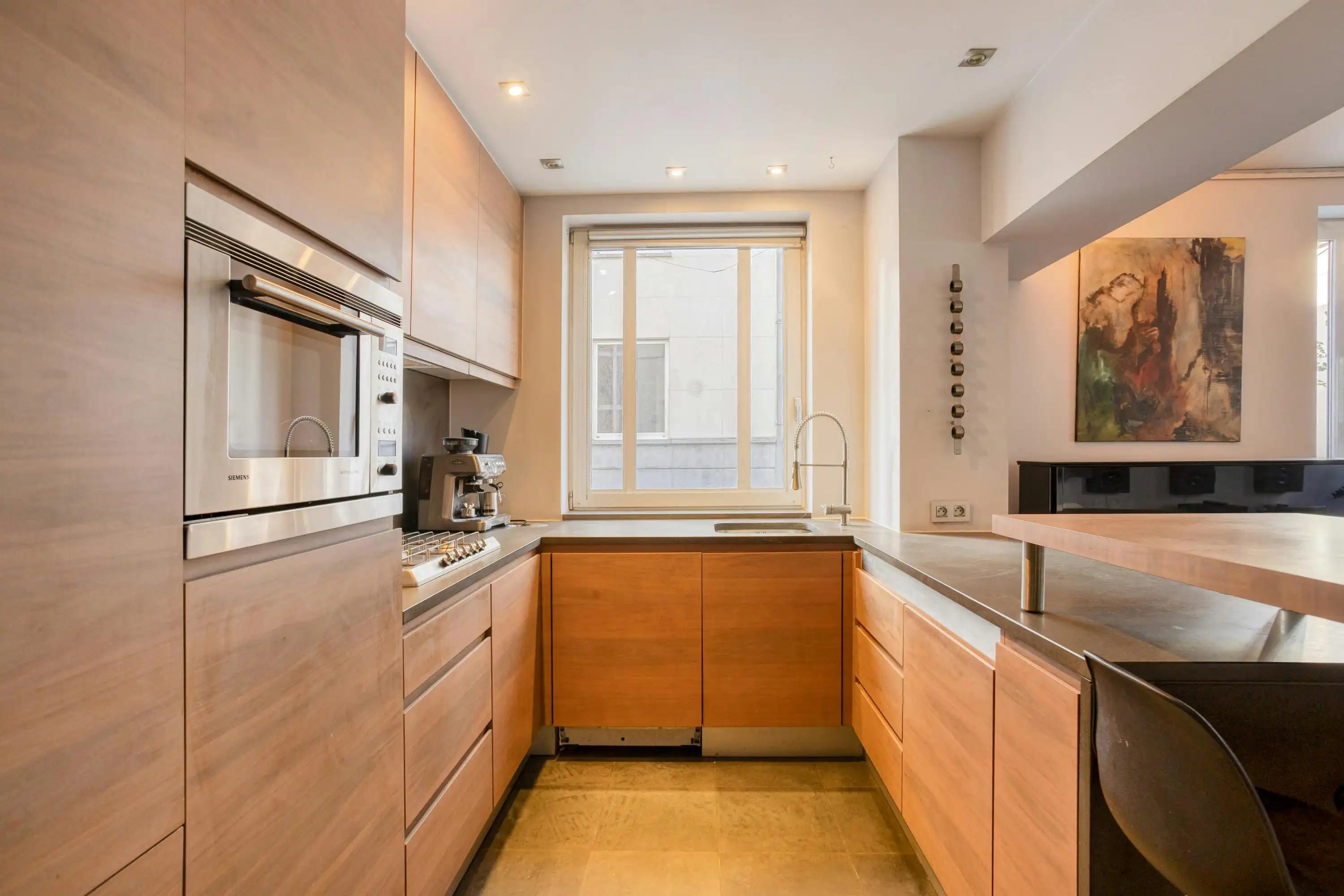 Lichtrijke design loft met stadsterras op 1 min van Dansaert foto 8