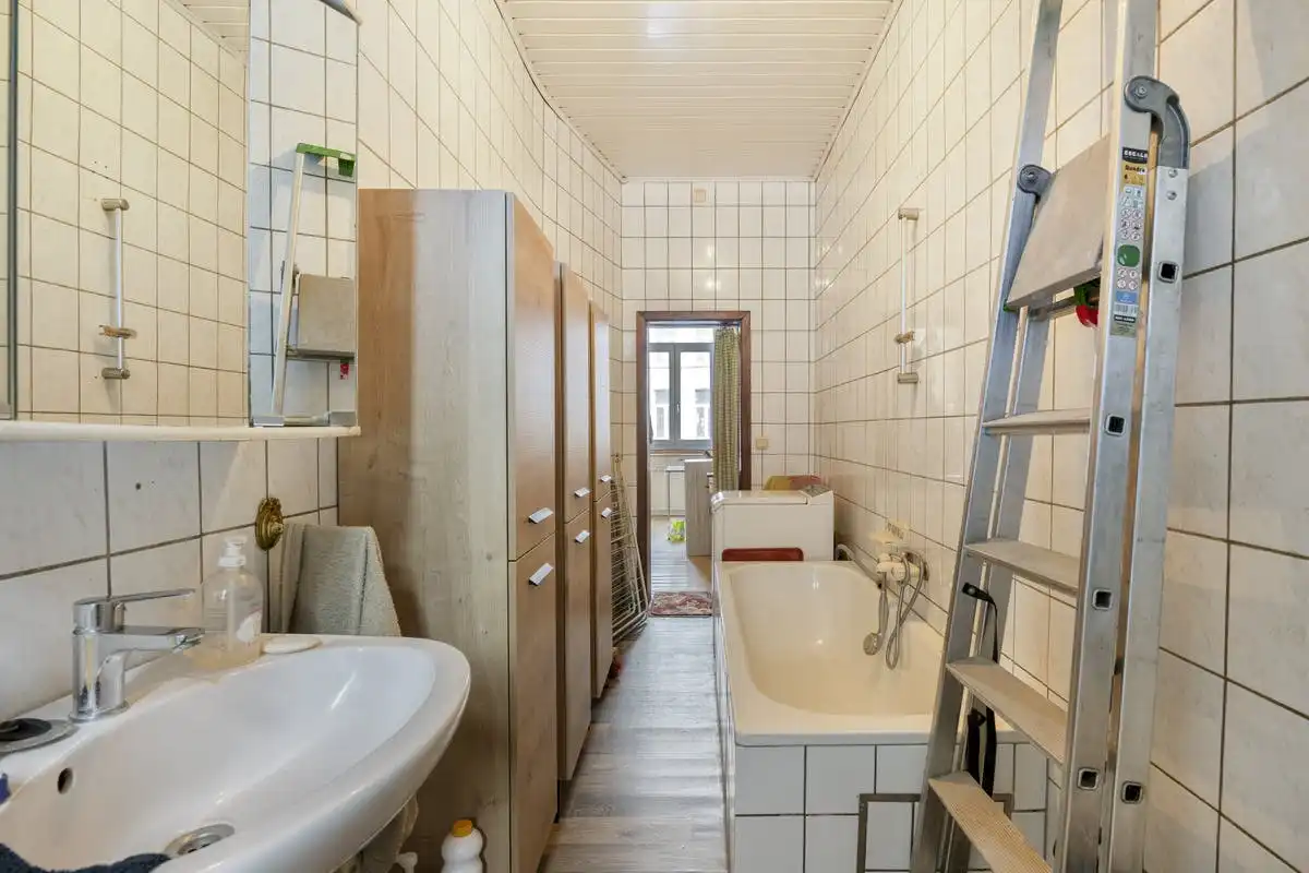 Opbrengsteigendom met renovatiepotentieel in Anderlecht foto 28