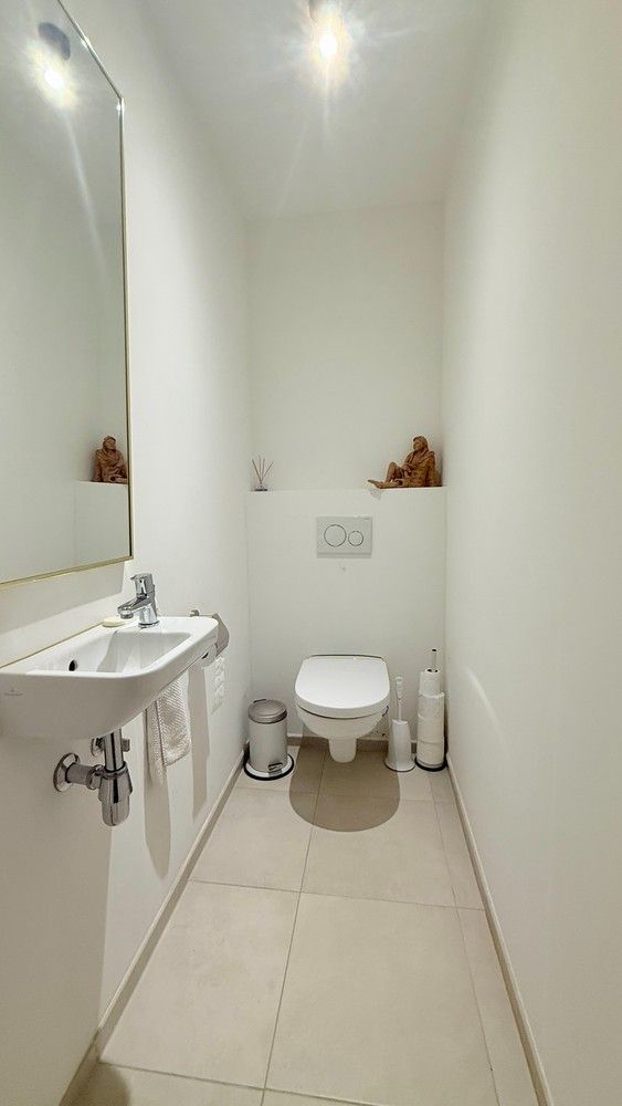 Modern gelijkvloers appartement met 1 slaapkamer en ruim terras/tuin in hartje Lanaken foto 13