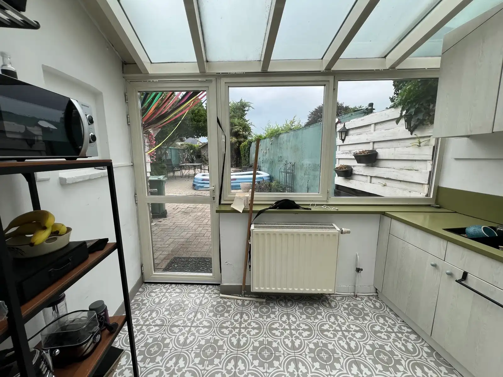 Woning met 2 slaapkamers, tuintje en ruime tuinberging foto 7