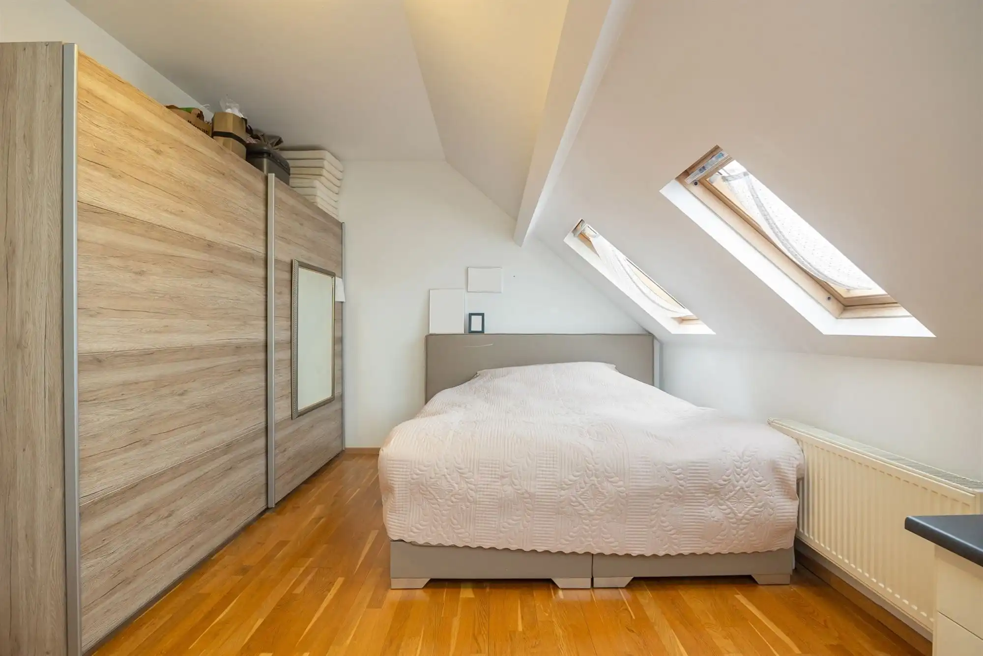 Instapklare woning met 2 à 3 slaapkamers en stadskoer foto 16