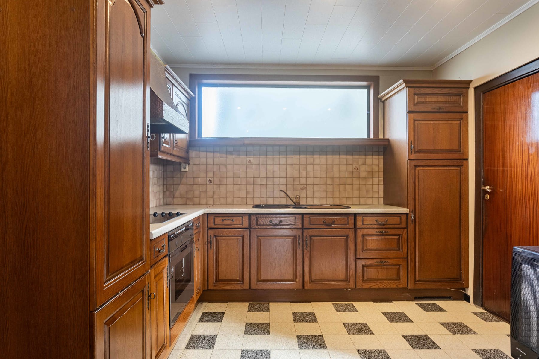 Rustig gelegen open bebouwing met privatieve oprit  foto 6