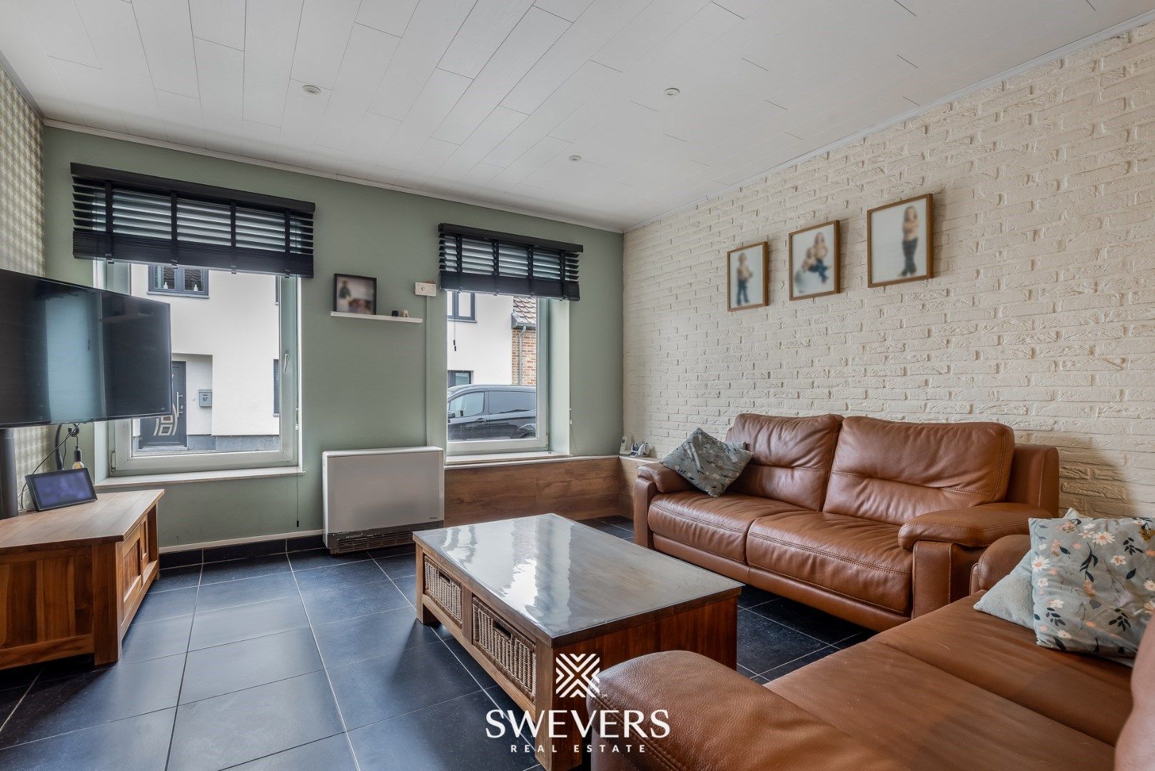 Gezellige woning met veranda, garage & zonnige tuin foto 4