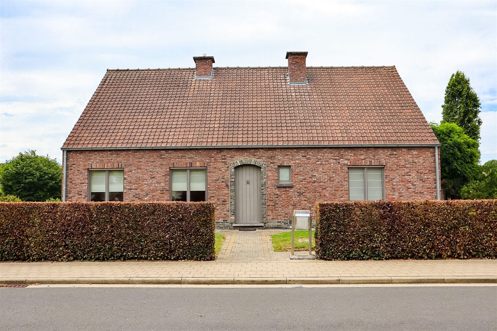 Open bebouwing op 1000m² te Ename foto 2