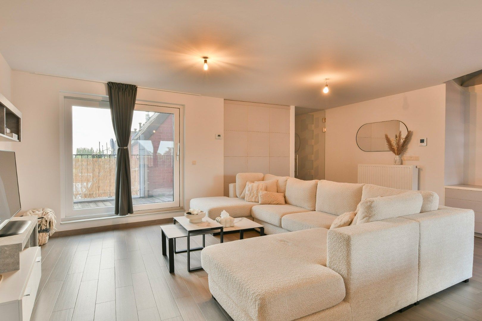 Ruim duplex appartement met 2 slaapkamers, 2 terrassen en garage te Oudenburg foto 3