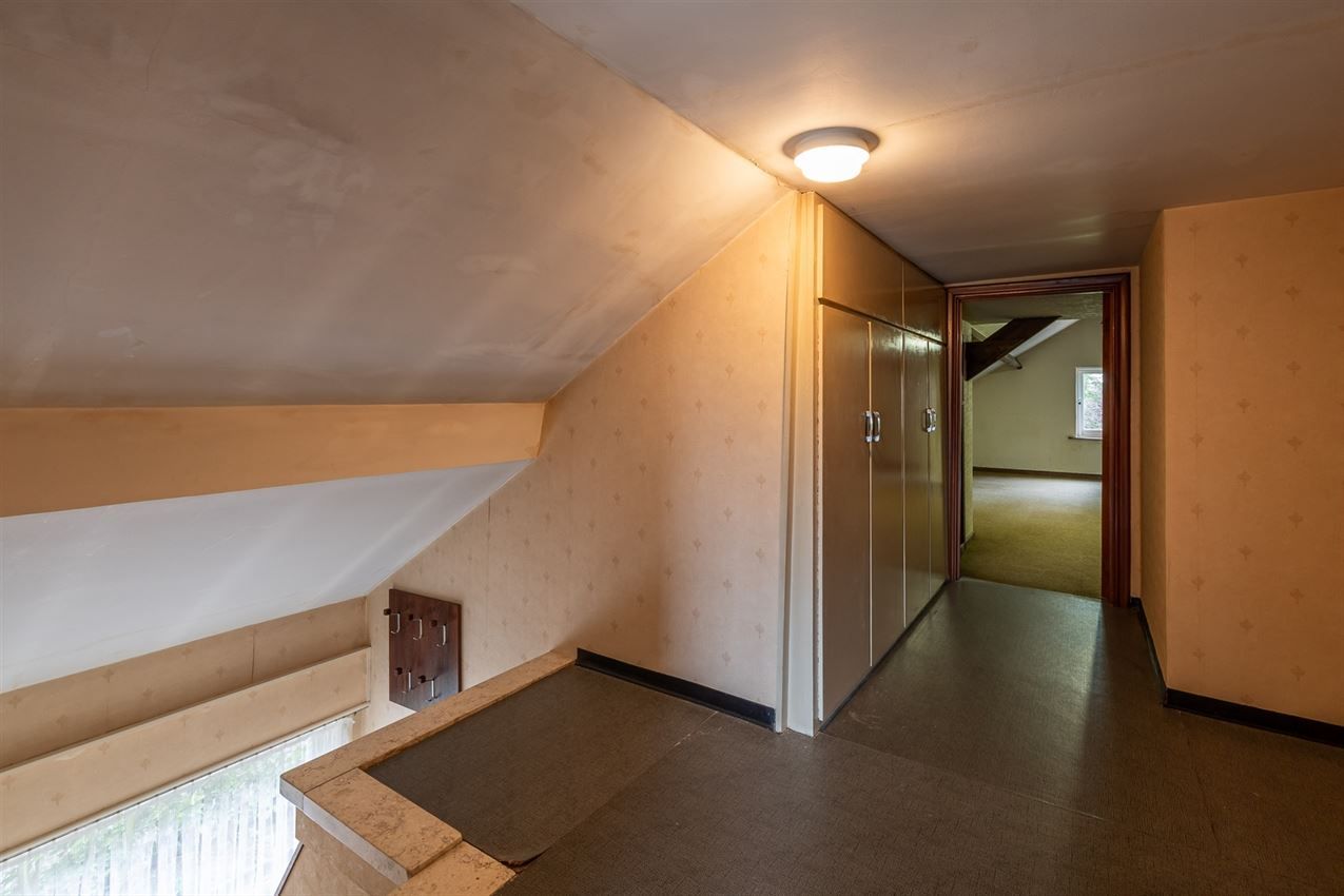 Te renoveren woning met 4 slk. in het hart van Averbode foto 22