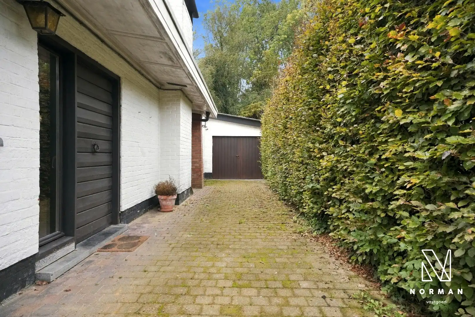 Gelijkvloerse woning op groene topligging aan het Heulebeekdomein in Kuurne met 4 slaapkamers, garage en ruime tuin te koop op perceel van +/- 1500 m²! foto 4