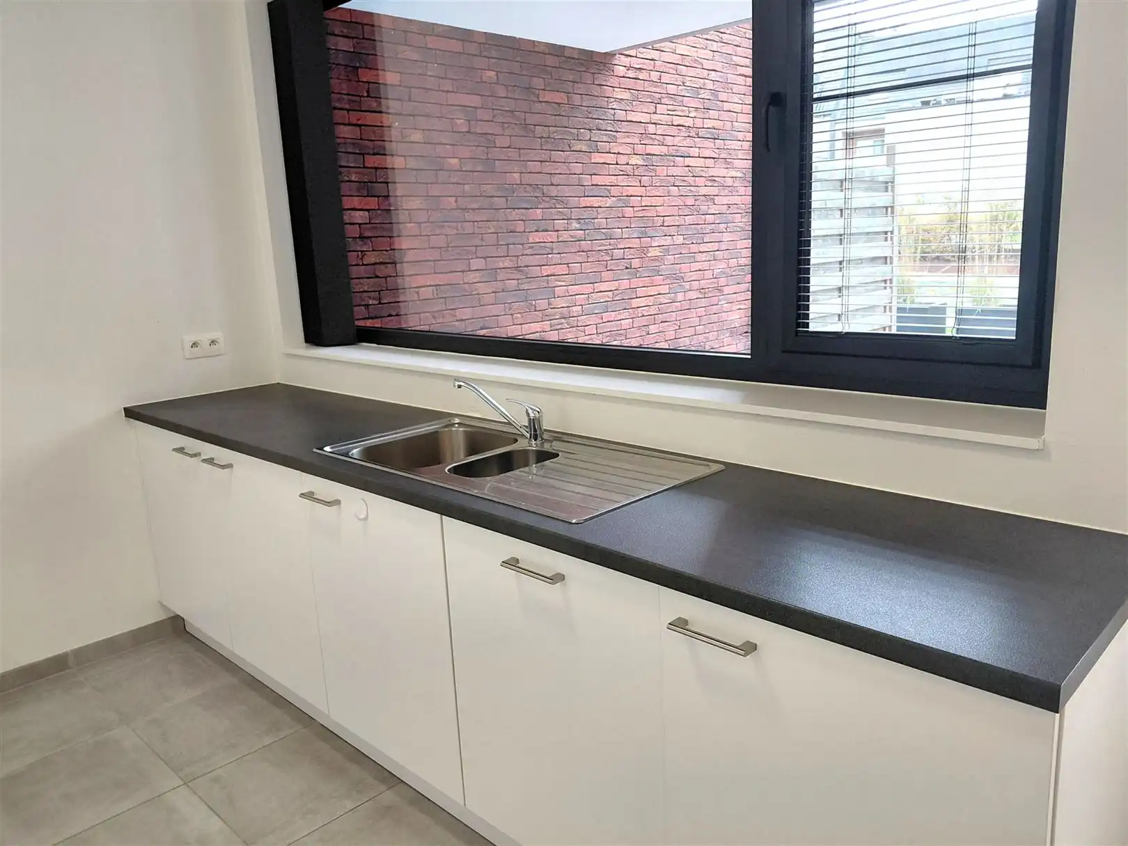 TE HUUR: Gelijkvloers appartement met 2 slaapkamers te Heusden!  foto 9