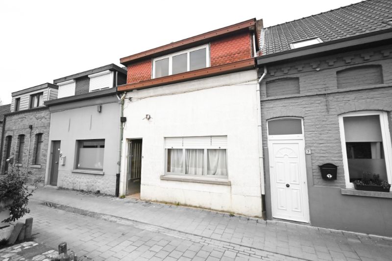 Te renoveren starterswoning nabij het centrum van Haaltert foto 1