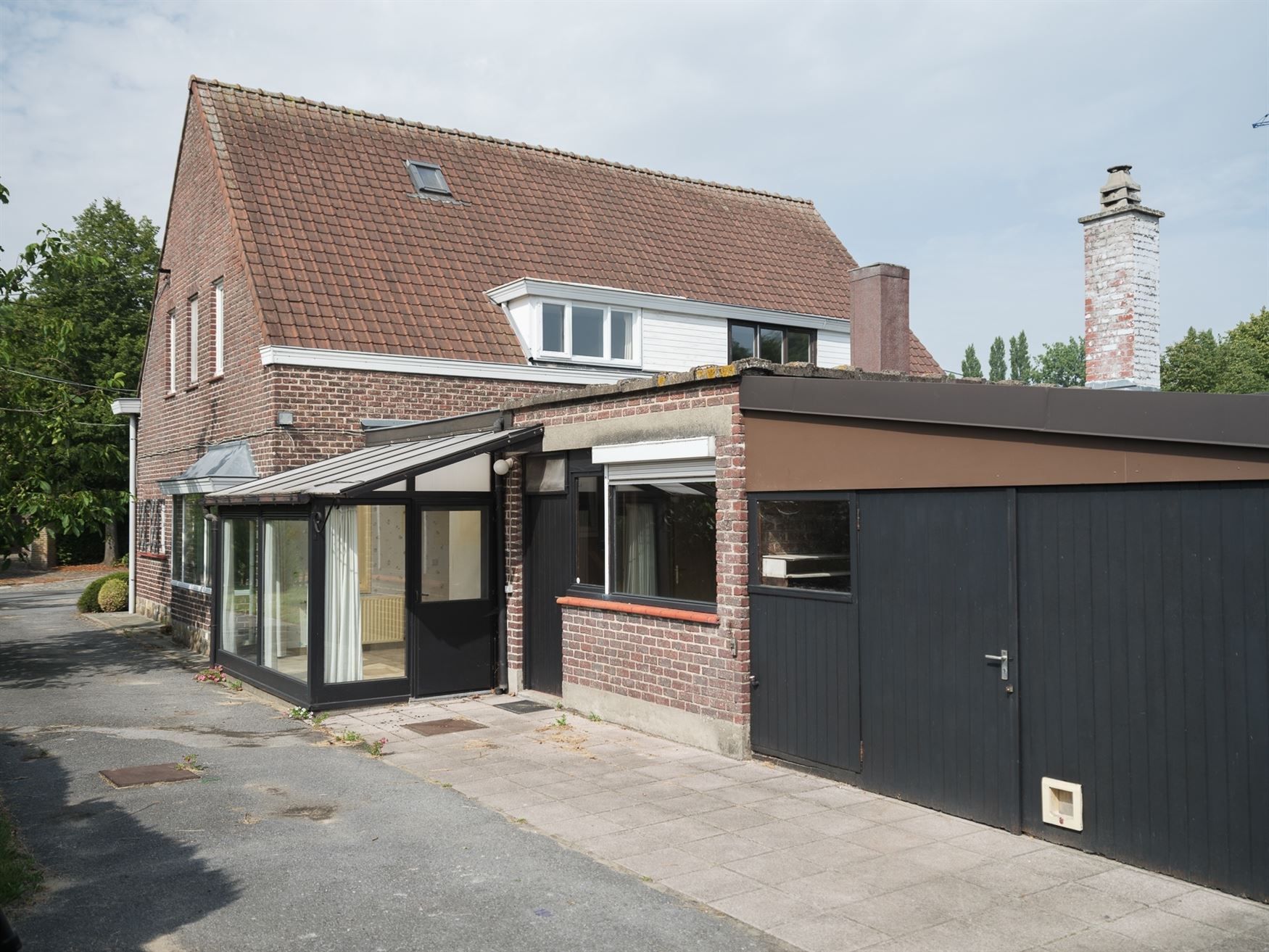 Halfopen renovatieparel in hartje Sint-Martens-Latem foto 4