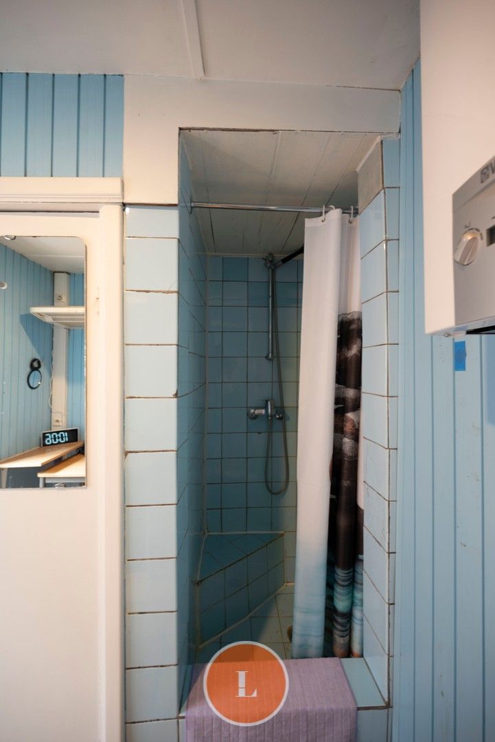 Te renoveren woning te koop in centrum Menen foto 7