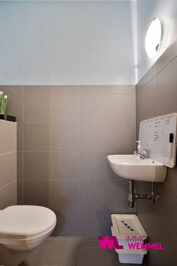 Gelijkvloersappartement met 2 slaapkames en kelder. foto 16