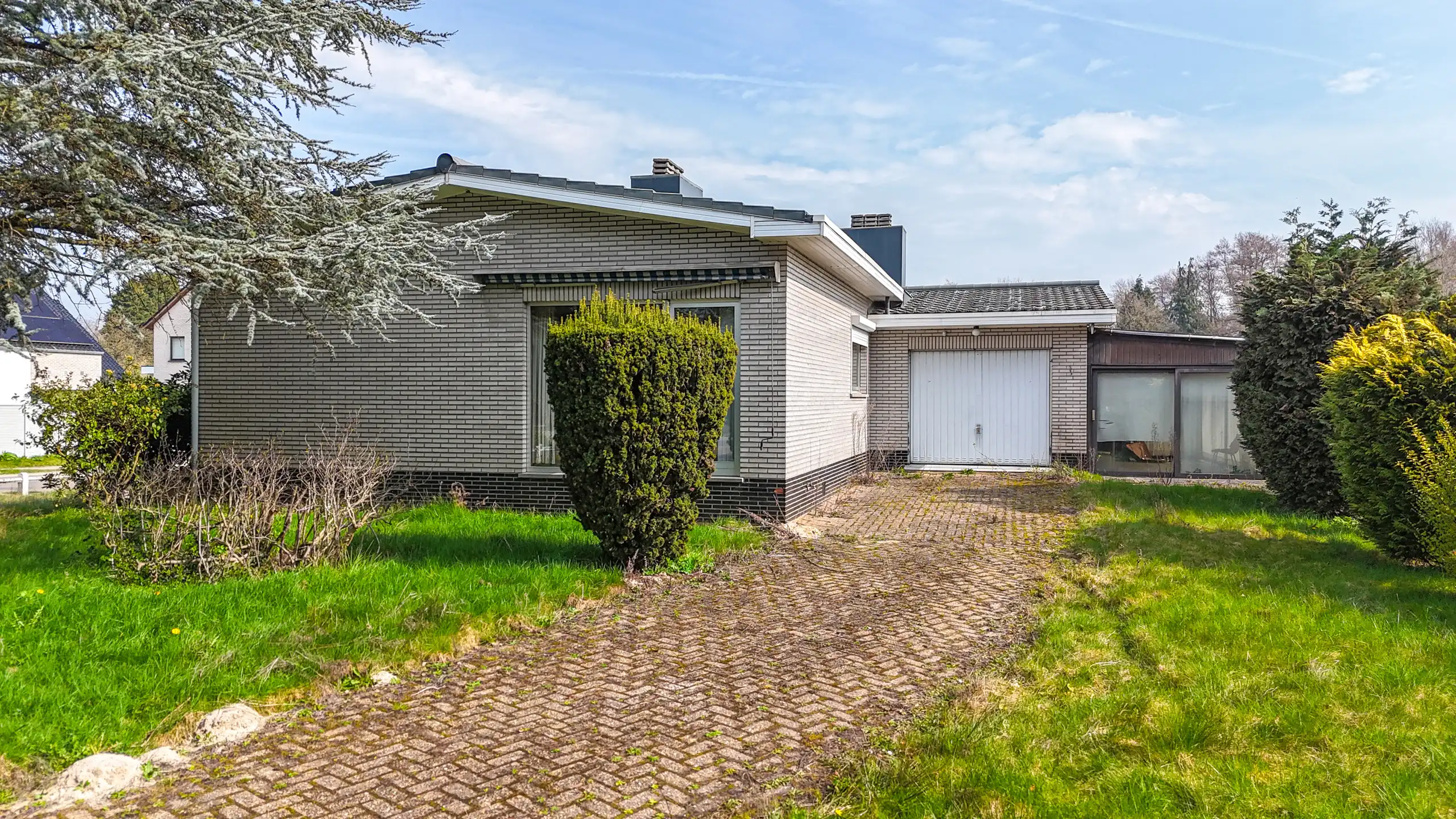 Rustig gelegen bungalow op zeer ruim perceel in Heusden! foto 23
